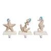 Transpac Coastal Christmas Stocking Holder Set Of 3 Colorful Resin Mantel Decorations For Holiday Decor And Gift Giving