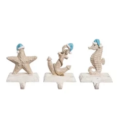 Transpac Coastal Christmas Stocking Holder Set Of 3 Colorful Resin Mantel Decorations For Holiday Decor And Gift Giving